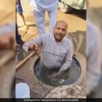 Video: BJP Councillor Cleans Choked Sewer In Gwalior