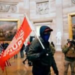 Proud Boys and Oath Keepers among  1,500 Capitol riot defendants who  Trump pardoned