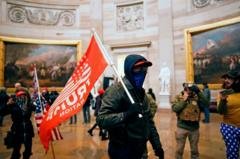 Proud Boys and Oath Keepers among  1,500 Capitol riot defendants who  Trump pardoned