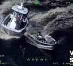 Moment unconscious man is rescued from out of control boat