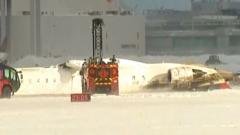 Upturned plane lies on Toronto runway after crash