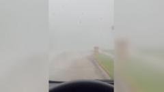 Woman trapped in car films as tornado hits Central Florida